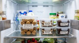 No-bake energy bites and dessert bars stored in airtight containers in the refrigerator