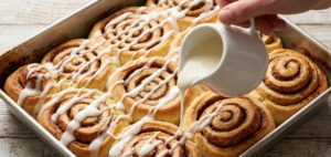 Spread the glaze while the rolls are still warm for that gooey, melt-in bakery finish