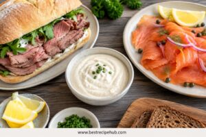 Horseradish sauce served with roast beef sandwich and smoked salmon on a table spread